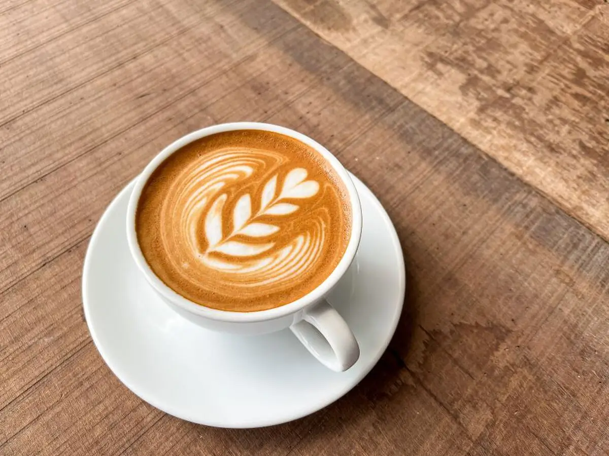 Latte coffee served in a white cup